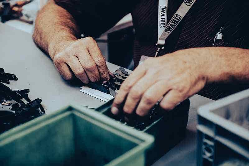 wahl factory employee assembling wahl clipper